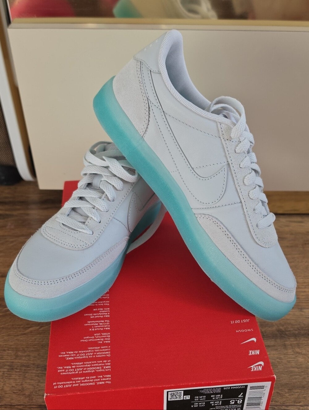 Nike Women’s Sneakers in Light Gray with Teal Sole